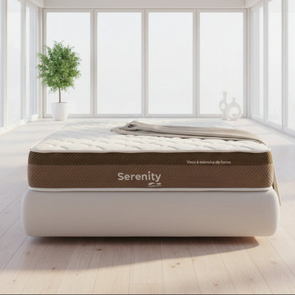 Serenity mattress with brand name on a bed in a room setting
